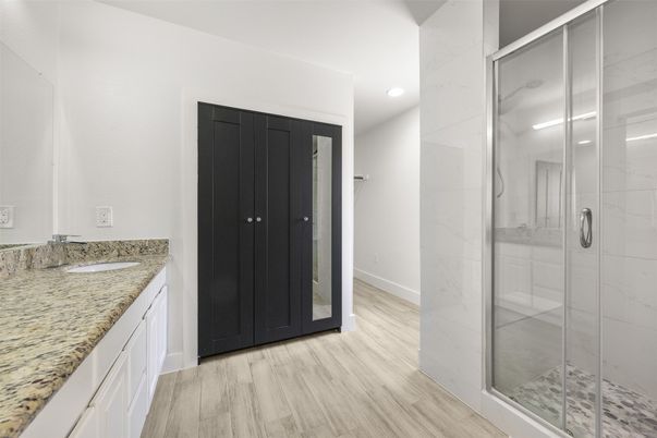 Bathroom, Glass Shower, Interior, Marble Walls, Recessed Lighting, Wood Texture Flooring
