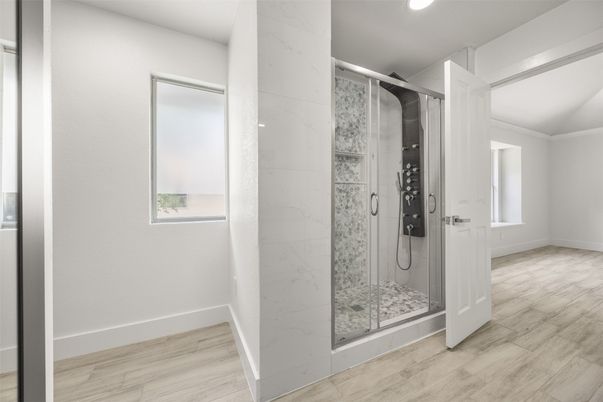 Bathroom, Glass Shower, Interior, Marble Walls, Recessed Lighting, Wood Texture Flooring