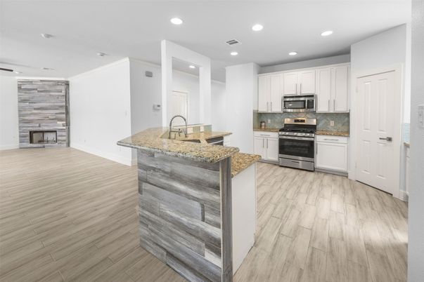 Interior, Kitchen, Recessed Lighting, Stainless Steel Appliances, Wood Texture Flooring