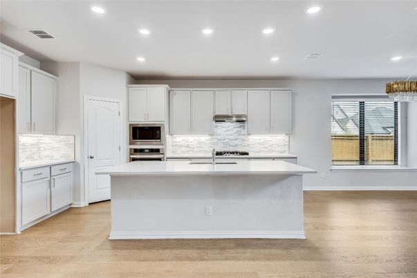Chandelier, Interior, Kitchen, Recessed Lighting, Stainless Steel Appliances, Wood Texture Flooring