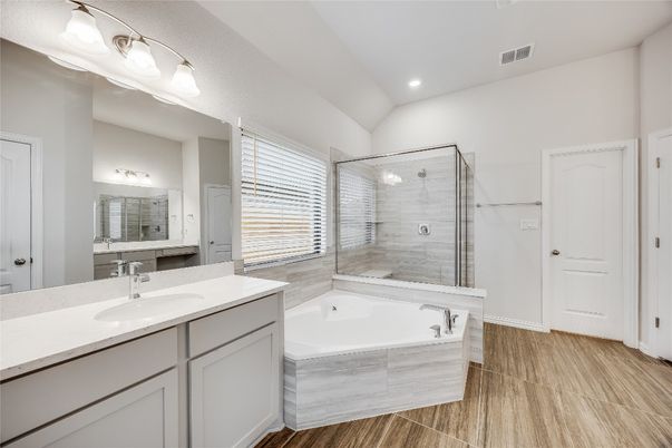Bathroom, Dual Sink Vanities, Glass Shower, Interior, Recessed Lighting, Wood Texture Flooring