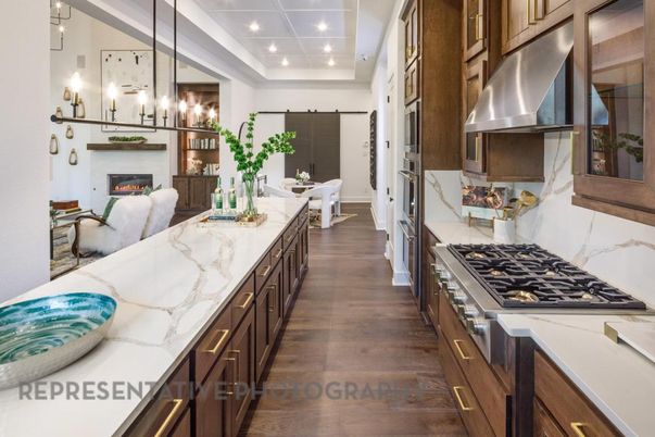 Dining room, Fireplace, Interior, Kitchen, Pendant Lights, Recessed Lighting, Stainless Steel Appliances, Wood Texture Flooring