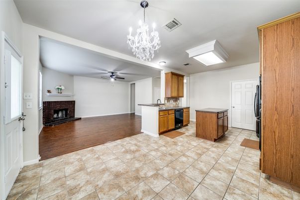 Chandelier, Empty room, Fireplace, Interior, Kitchen, Wood Texture Flooring