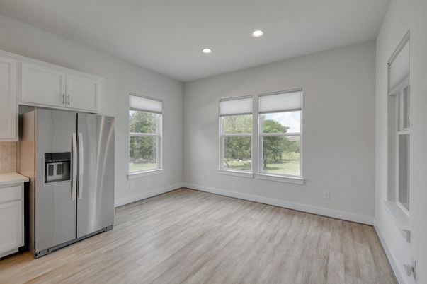 Empty room, Interior, Kitchen, Recessed Lighting, Washer, Wood Texture Flooring