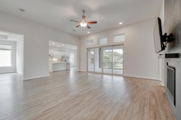 Empty room, Fireplace, Interior, Kitchen, Recessed Lighting, Wood Texture Flooring