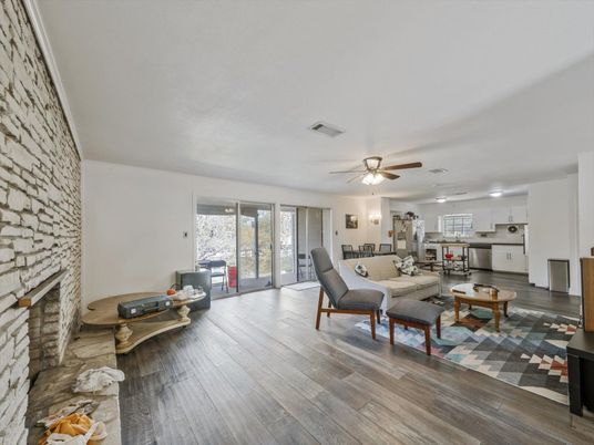 Fireplace, Interior, Kitchen, Living room, Recessed Lighting, Stone Walls, Wood Texture Flooring