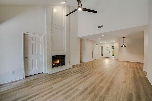 Empty room, Fireplace, Interior, Pendant Lights, Recessed Lighting, Wood Texture Flooring