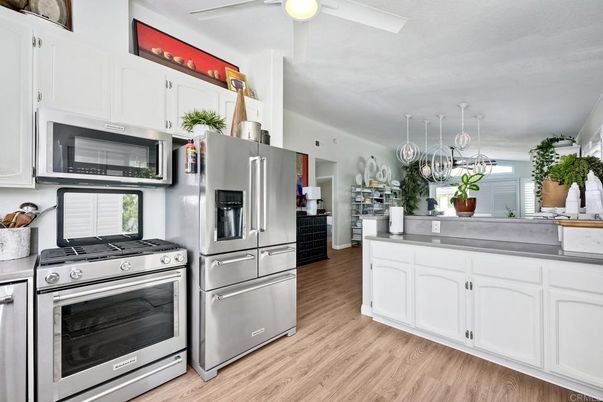 Interior, Kitchen, Pendant Lights, Stainless Steel Appliances, Wood Texture Flooring