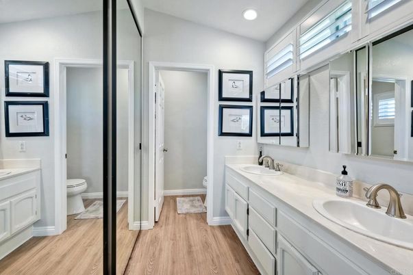Bathroom, Dual Sink Vanities, Interior, Recessed Lighting, Wood Texture Flooring