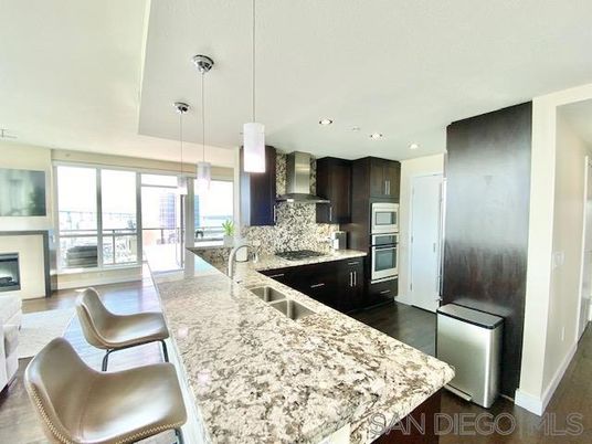 Fireplace, Interior, Kitchen, Pendant Lights, Recessed Lighting, Stainless Steel Appliances