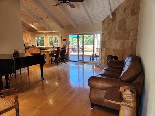 Dining room, Fireplace, Interior, Living room, Piano, Stone Walls, Wood Texture Flooring