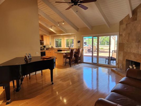 Dining room, Fireplace, Interior, Kitchen, Living room, Piano, Recessed Lighting, Stone Walls, Wood Texture Flooring