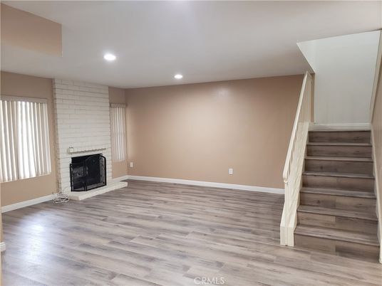 Empty room, Fireplace, Interior, Recessed Lighting, Wood Texture Flooring