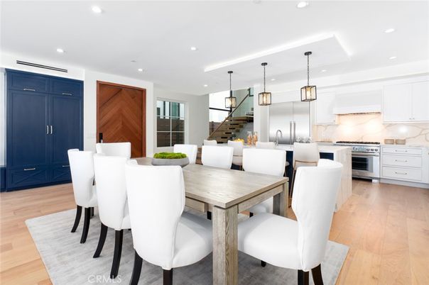 Dining room, Interior, Kitchen, Pendant Lights, Recessed Lighting, Stainless Steel Appliances, Wood Texture Flooring