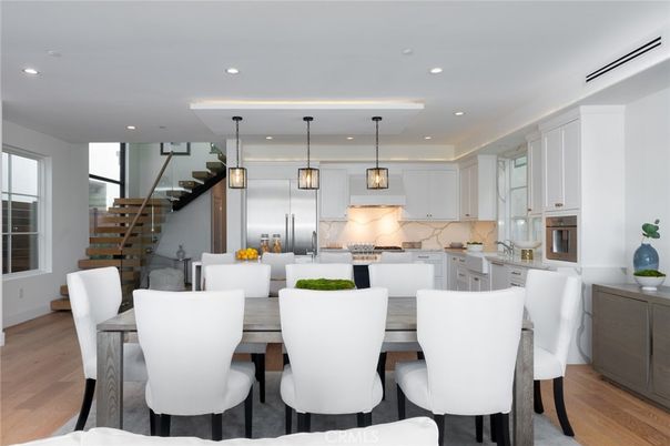 Dining room, Interior, Kitchen, Pendant Lights, Recessed Lighting, Stainless Steel Appliances, Wood Texture Flooring