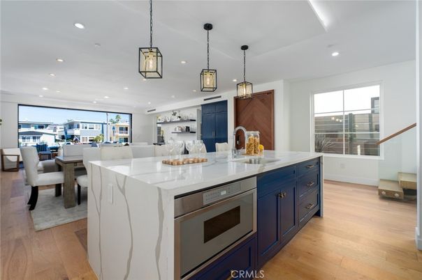 Dining room, Interior, Kitchen, Pendant Lights, Recessed Lighting, Stainless Steel Appliances, Wood Texture Flooring