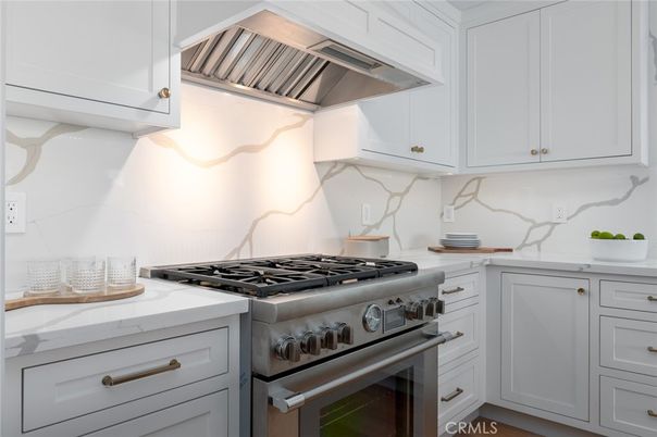 Interior, Kitchen, Marble Walls, Stainless Steel Appliances, Wood Texture Flooring