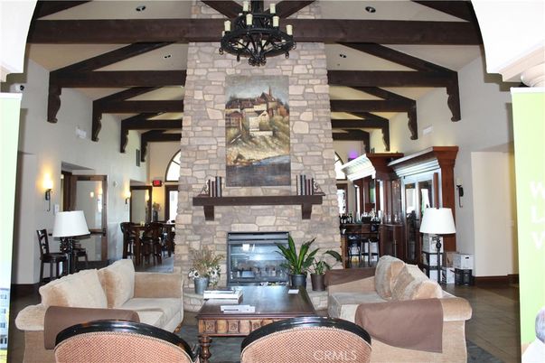 Fireplace, Interior, Living room, Recessed Lighting, Stone Walls, Wooden Beams