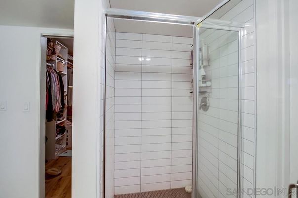 Bathroom, Glass Shower, Interior, Recessed Lighting, Walk-in Closets, Wood Texture Flooring