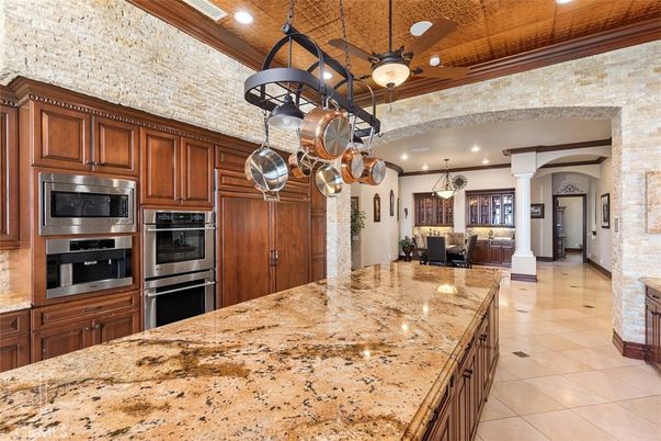 Interior, Kitchen, Pendant Lights, Recessed Lighting, Stainless Steel Appliances, Stone Walls