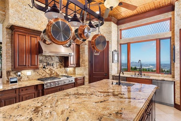 Interior, Kitchen, Recessed Lighting, Stainless Steel Appliances, Stone Walls