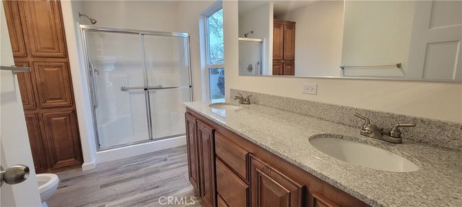 Bathroom, Dual Sink Vanities, Glass Shower, Interior, Wood Texture Flooring