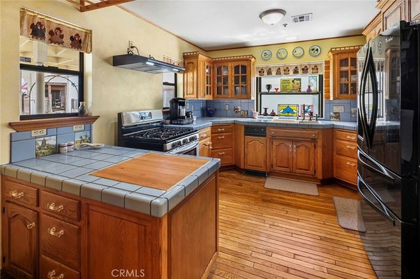 Interior, Kitchen, Tile Countertops, Wood Texture Flooring