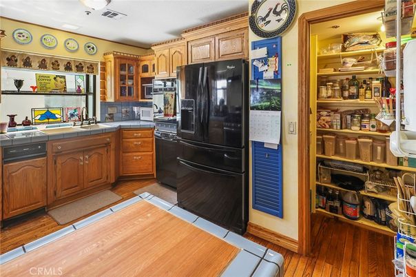 Interior, Kitchen, Tile Countertops, Wood Texture Flooring
