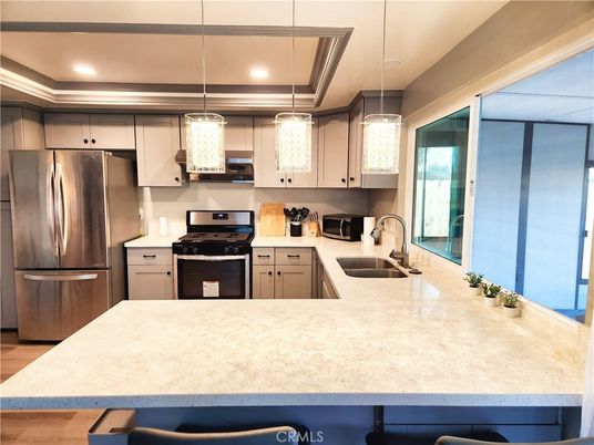 Interior, Kitchen, Pendant Lights, Recessed Lighting, Stainless Steel Appliances, Wood Texture Flooring