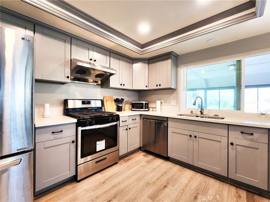 Interior, Kitchen, Recessed Lighting, Stainless Steel Appliances, Wood Texture Flooring