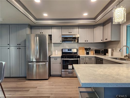 Interior, Kitchen, Recessed Lighting, Stainless Steel Appliances, Wood Texture Flooring