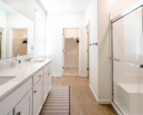 Bathroom, Dual Sink Vanities, Glass Shower, Interior, Wood Texture Flooring