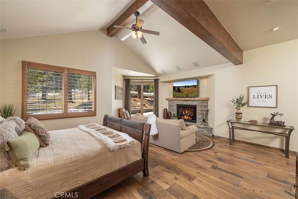 Bedroom, Fireplace, Interior, Living room, Recessed Lighting, Wooden Beams, Wood Texture Flooring