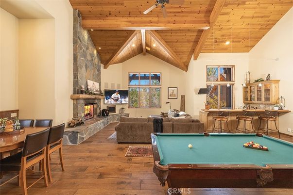 Billiard Table, Fireplace, Game Room, Interior, Living room, Recessed Lighting, Wooden Beams, Wooden Ceilings, Wood Texture Flooring