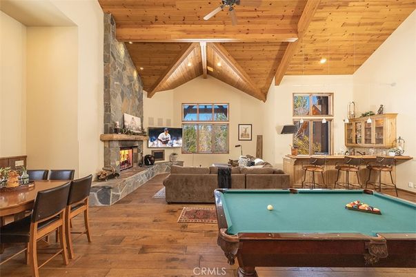 Billiard Table, Fireplace, Game Room, Interior, Living room, Recessed Lighting, Wooden Beams, Wooden Ceilings, Wood Texture Flooring