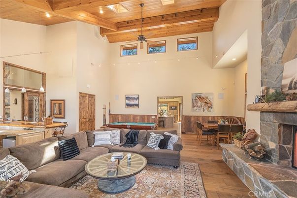 Billiard Table, Dining room, Fireplace, Game Room, Interior, Living room, Recessed Lighting, Wooden Beams, Wooden Ceilings, Wood Texture Flooring