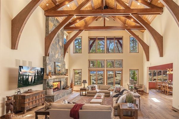 Chandelier, Dining room, Fireplace, Interior, Living room, Recessed Lighting, Wooden Beams, Wooden Ceilings, Wood Texture Flooring