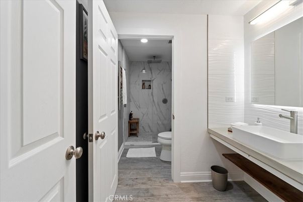 Bathroom, Interior, Marble Walls, Recessed Lighting, Wood Texture Flooring