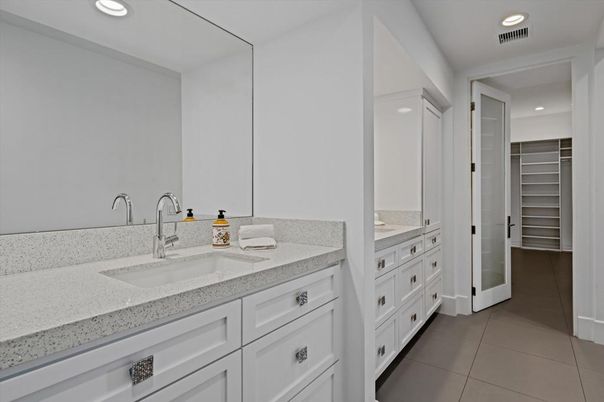Bathroom, Dual Sink Vanities, Interior, Recessed Lighting, Walk-in Closets