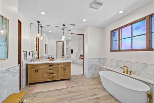 Bathroom, Dual Sink Vanities, Free Standing Baths, Interior, Pendant Lights, Recessed Lighting, Wood Texture Flooring