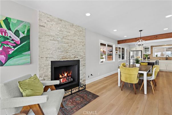 Dining room, Fireplace, Interior, Living room, Pendant Lights, Recessed Lighting, Stone Walls, Wooden Beams, Wood Texture Flooring
