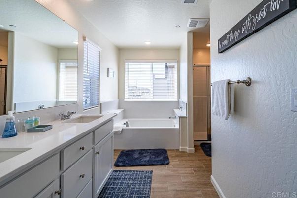 Bathroom, Dual Sink Vanities, Interior, Recessed Lighting, Wood Texture Flooring