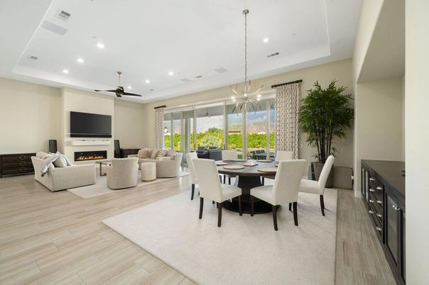 Dining room, Fireplace, Interior, Living room, Pendant Lights, Recessed Lighting, Wood Texture Flooring