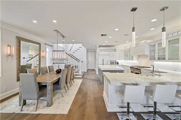 Dining room, Interior, Kitchen, Pendant Lights, Recessed Lighting, Stainless Steel Appliances, Wood Texture Flooring