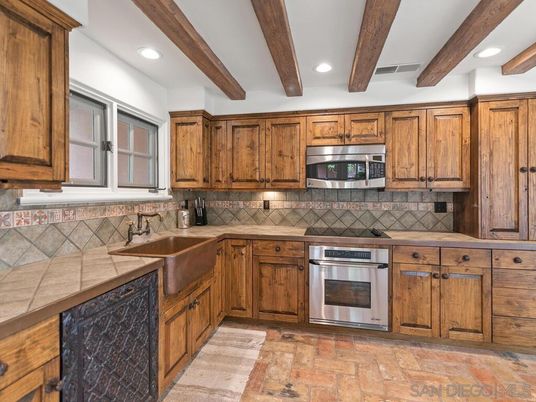 Interior, Kitchen, Recessed Lighting, Stainless Steel Appliances, Tile Countertops, Wooden Beams