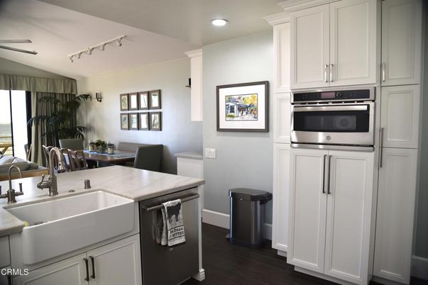 Dining room, Interior, Kitchen, Recessed Lighting, Stainless Steel Appliances, Wood Texture Flooring