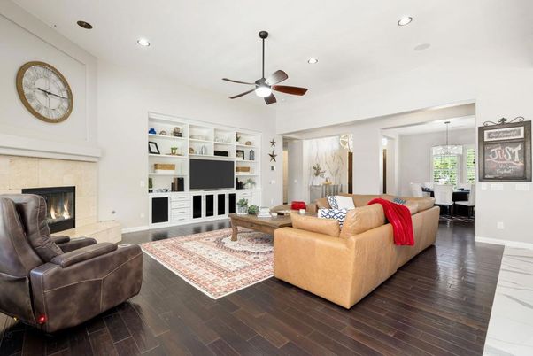 Chandelier, Dining room, Fireplace, Interior, Living room, Pendant Lights, Recessed Lighting, Wood Texture Flooring