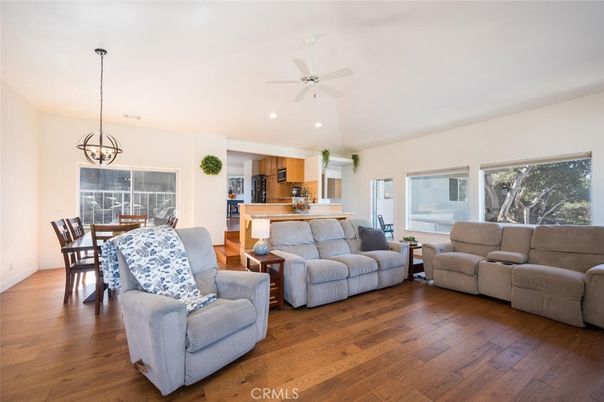 Chandelier, Dining room, Interior, Kitchen, Living room, Pendant Lights, Recessed Lighting, Wood Texture Flooring