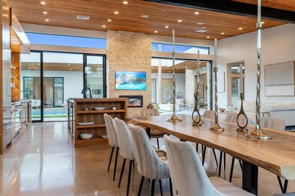 Dining room, Fireplace, Interior, Recessed Lighting, Stone Walls, Wooden Ceilings