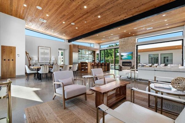 Dining room, Fireplace, Interior, Living room, Recessed Lighting, Stone Walls, Wooden Ceilings